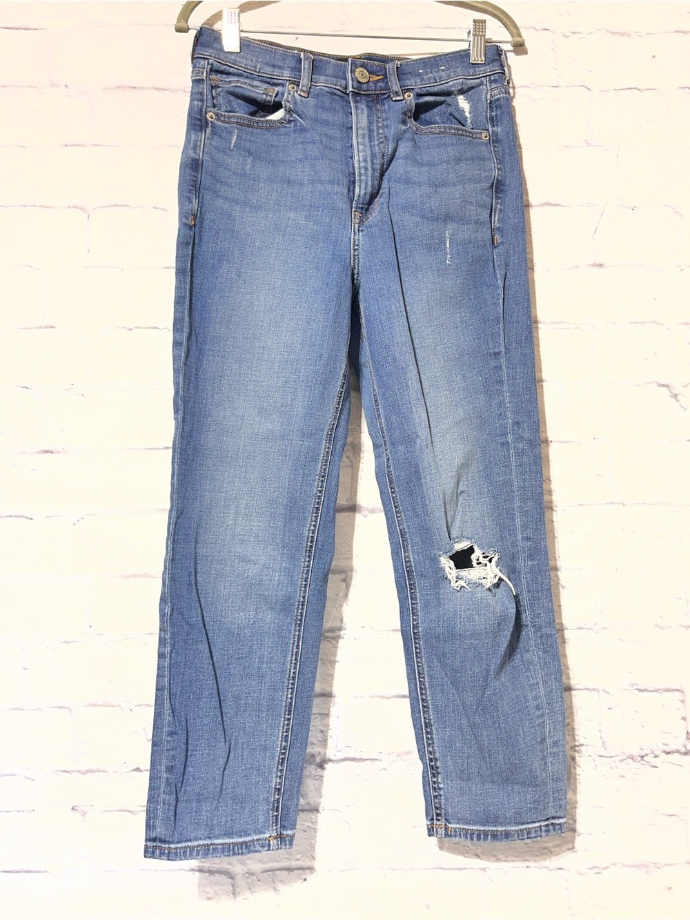 Express Women's Medium Blue Straight Leg Jeans with Subtle Distressing